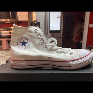 Brand new, never worn. High top white converse. Size 9.5 in women.